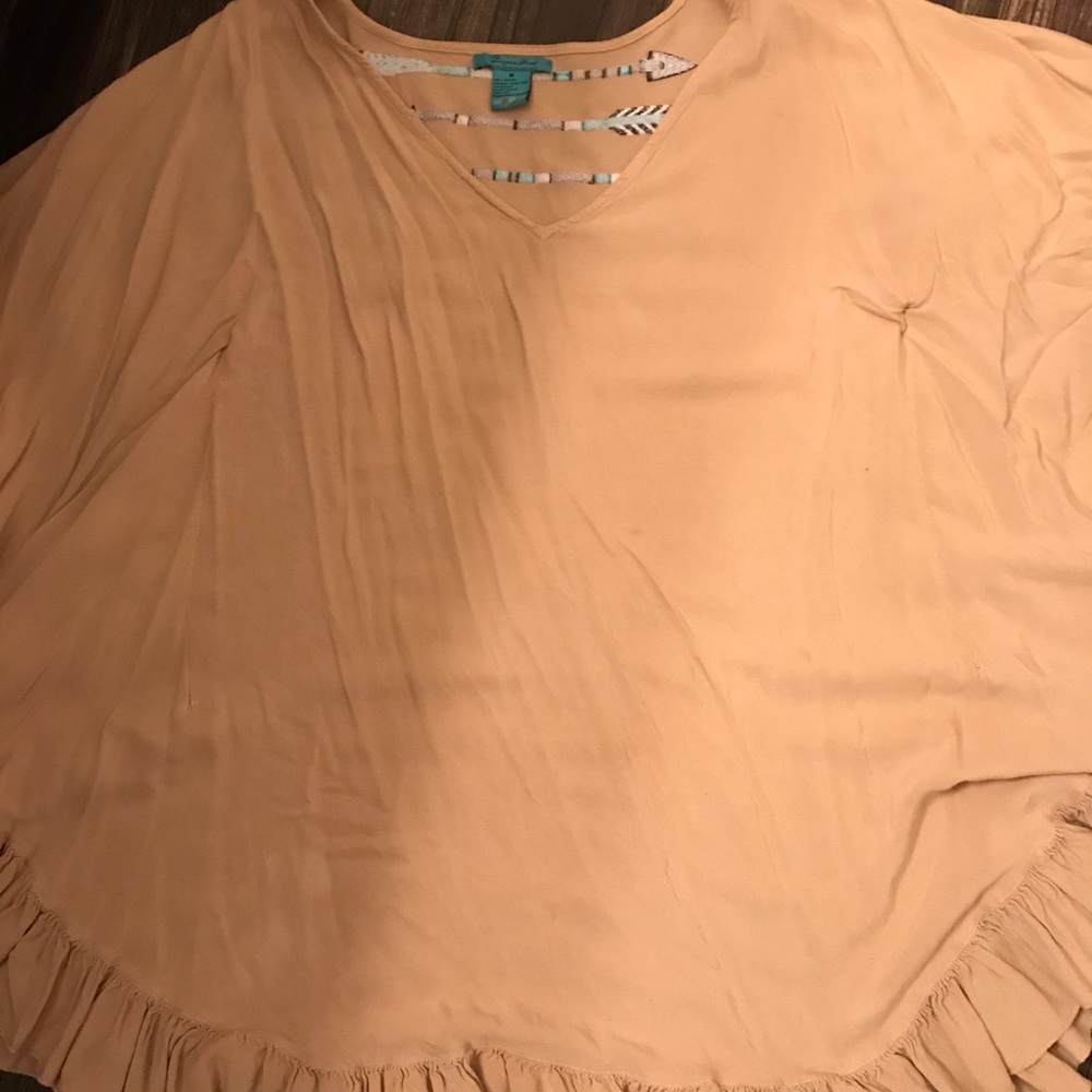 A tunic with western flare.
